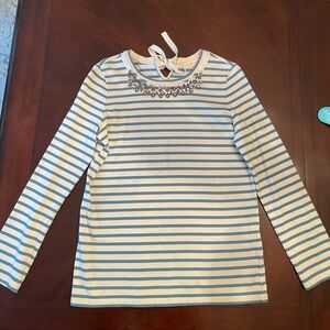 Tory Burch women’s long sleeve off-white and blue striped top, jeweled, tie back